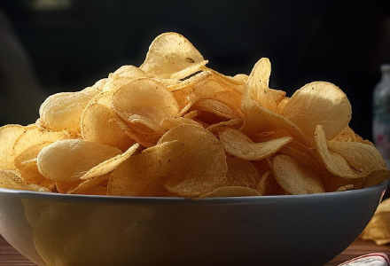 A bowl of potato chips.